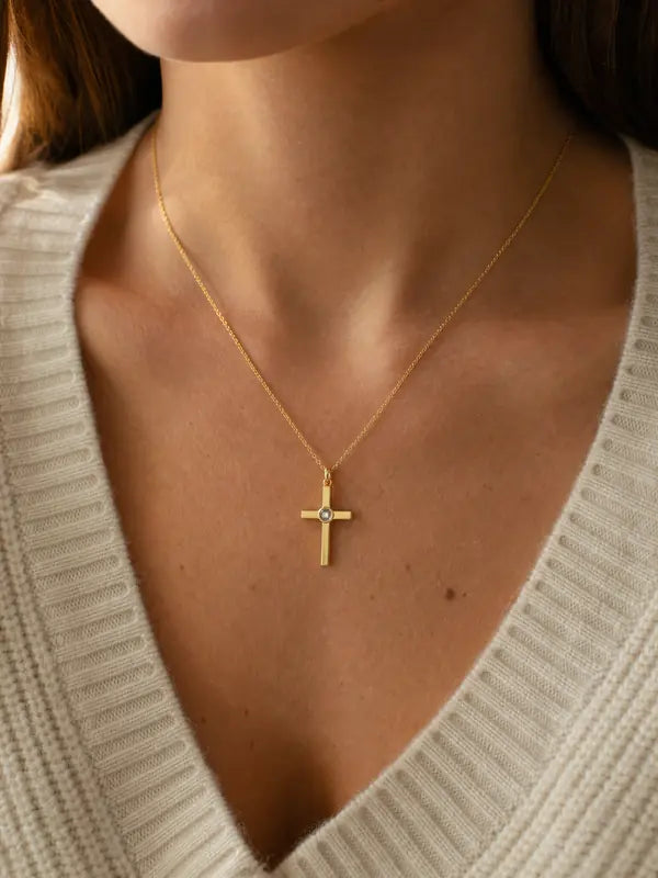 The pendant worn below the collarbone